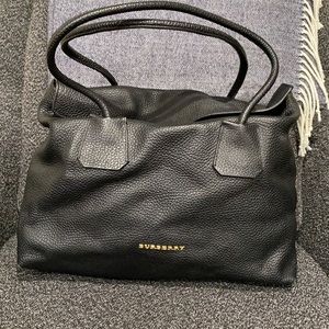 Gently used black leather Burberry bag.